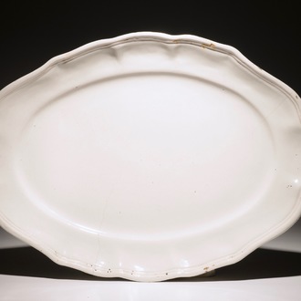 A large oval monochrome white platter, France, 18th C.